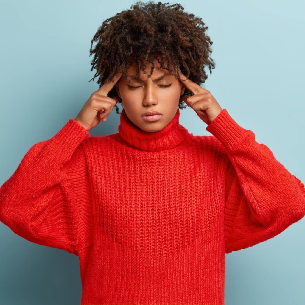 young-woman-with-afro-haircut-wearing-sweater