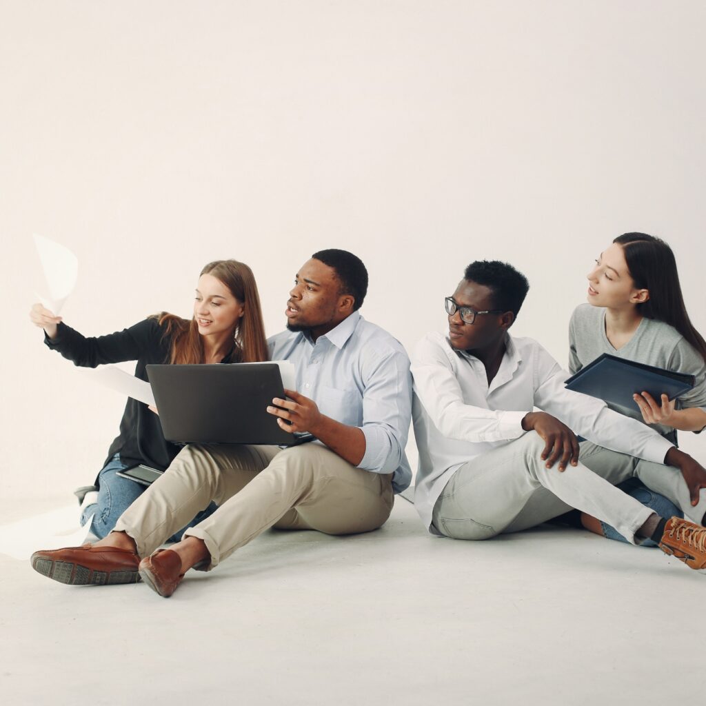 young-international-people-working-together-use-laptop