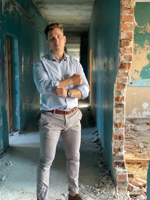 full-length-portrait-man-standing-entrance